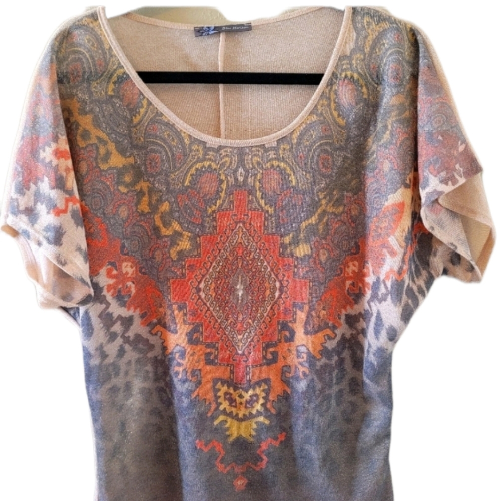 Blue Horizon blouse with gold and orange tones.